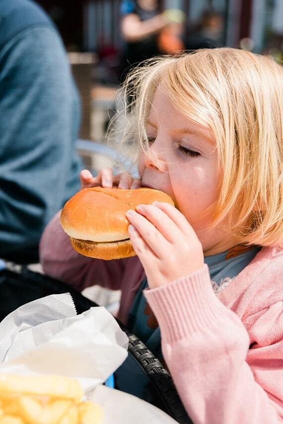 Girl eating a hamburger