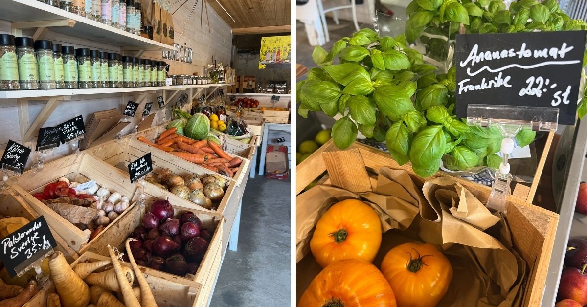 Lokalt gårdsbutik med färska grönsaker, rotfrukter och örter i trälådor – närproducerade råvaror i småskalig idyll.