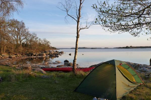 Kayaking in the archipelago & camping at dusk.