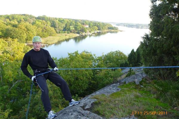 Rappelling from a 30m cliff in the archipelago and grilling at dusk.