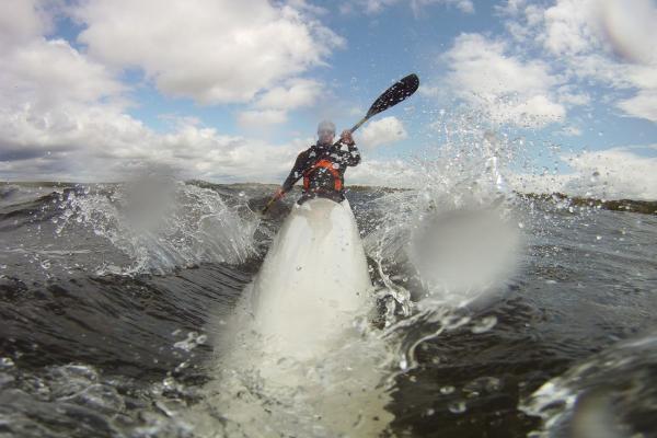 Test to kayak with a surfski in the small waves of archipelago of Karlskrona.