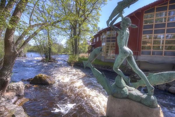 Statue in Mörrum river next to Laxens Hus